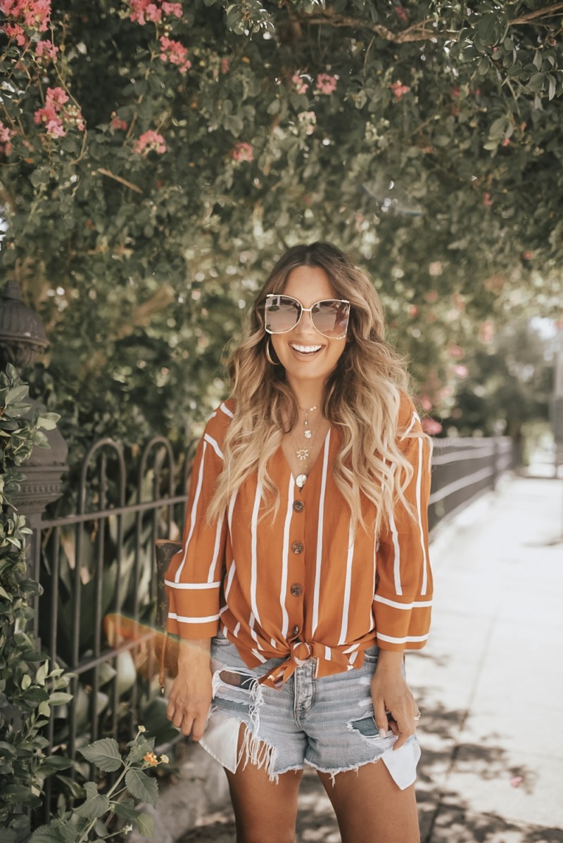 STRIPED TOP IN RUST CAN BE PAIRED WITH DENIM SHORTS AND WITH DENIM JEANS WHEN THE WEATHER GETS COOLER. READ MORE ON THE BLOG.