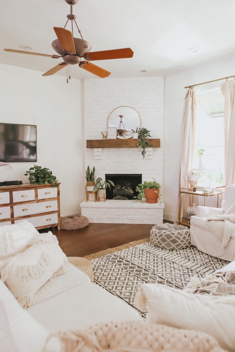 LIVING ROOM REFRESH WITH A FEW AFFORDABLE FINDS FRO TARGET AND OVERSTOCK. ROUND MIRROR, LOTS OF TEXTURE, PAMPAS GRASS, AND MORE ON THE BLOG.