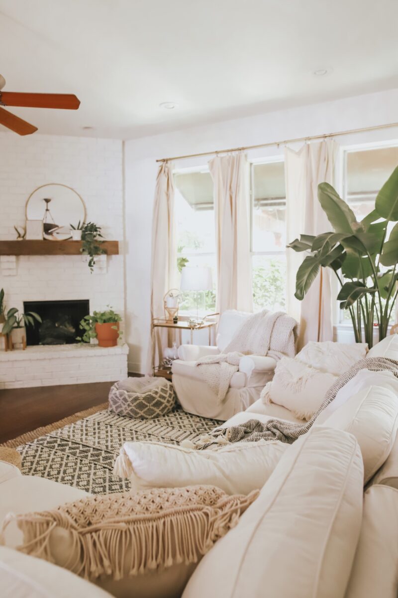 LIVING ROOM REFRESH WITH A FEW AFFORDABLE FINDS FRO TARGET AND OVERSTOCK. ROUND MIRROR, LOTS OF TEXTURE, PAMPAS GRASS, AND MORE ON THE BLOG.